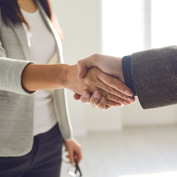 Man and woman shaking hands