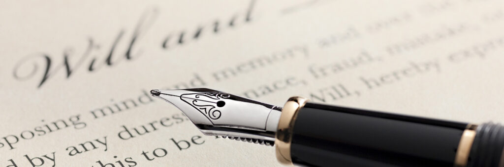 fountain pen writing a will on paper