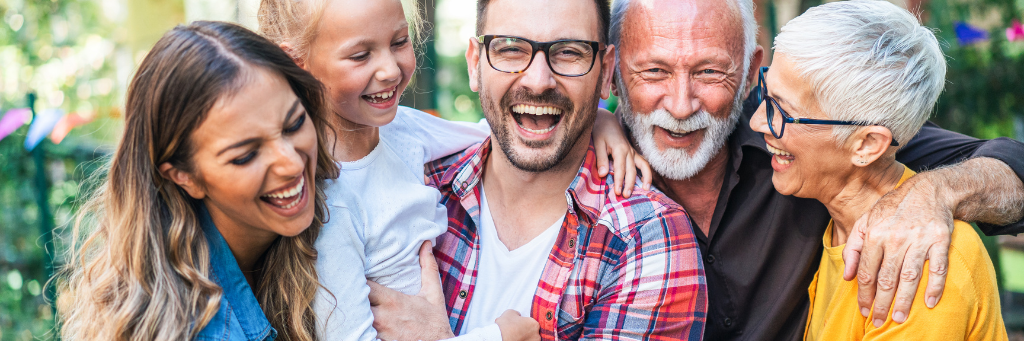 Photo showing a multi-generational family gathering.