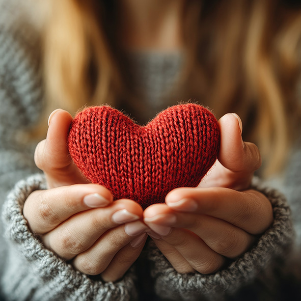 Person holding crotched heart