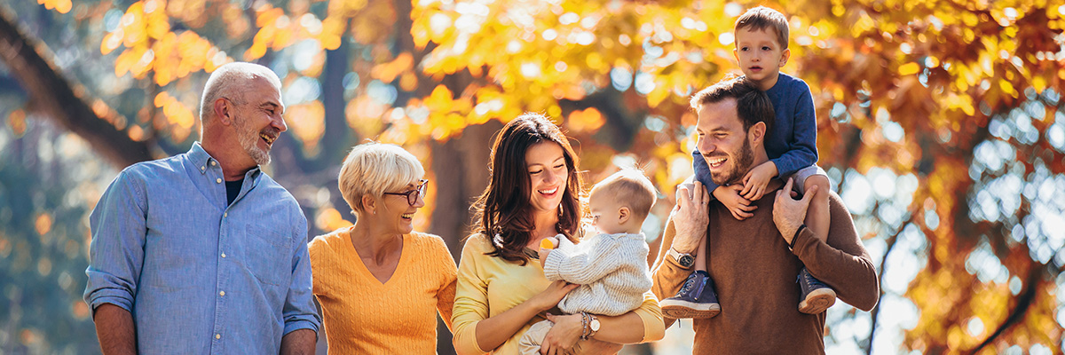 Should You Get Married to Save Inheritance Tax? Picture of a family taking an autumn walk together.