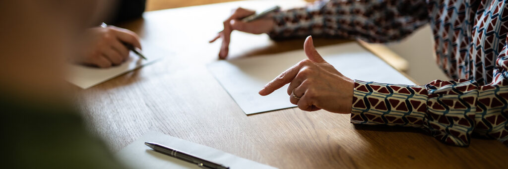 Why Your ‘Final Order’ Isn’t Final: Understanding Divorce Terminology in 2025 - Picture of a divorce lawyer discussing a financial order.