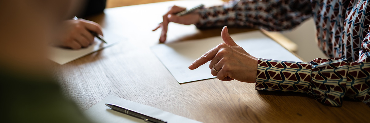 Why Your ‘Final Order’ Isn’t Final: Understanding Divorce Terminology in 2025 - Picture of a divorce lawyer discussing a financial order.