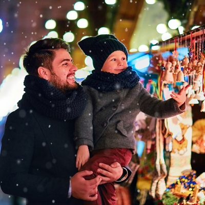 Picture of a father and son at Christmas - Last-Minute Co-Parenting Christmas Checklist.